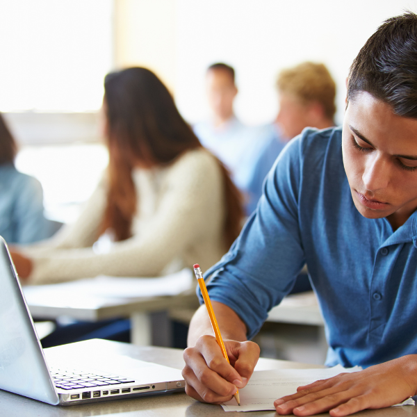 Student taking a virtual assessment at school